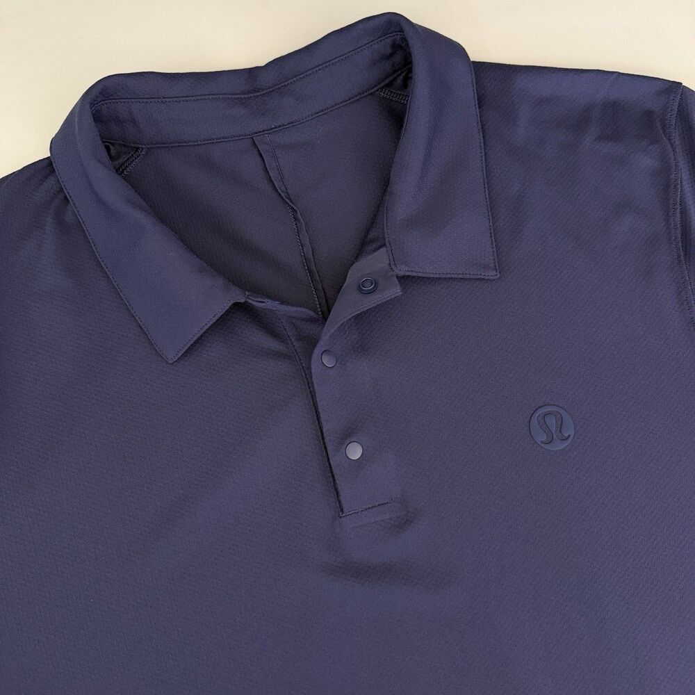 Lululemon Logo Pro Snap Front Short Sleeve Polo Shirt Size XL Navy Mens